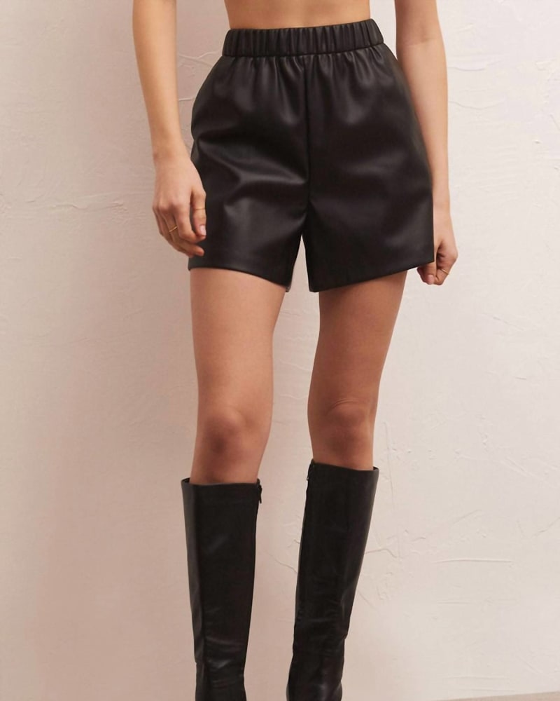 Front of a model wearing a size L Tia Faux Leather Short In Black in Black by Z Supply. | dia_product_style_image_id:356905